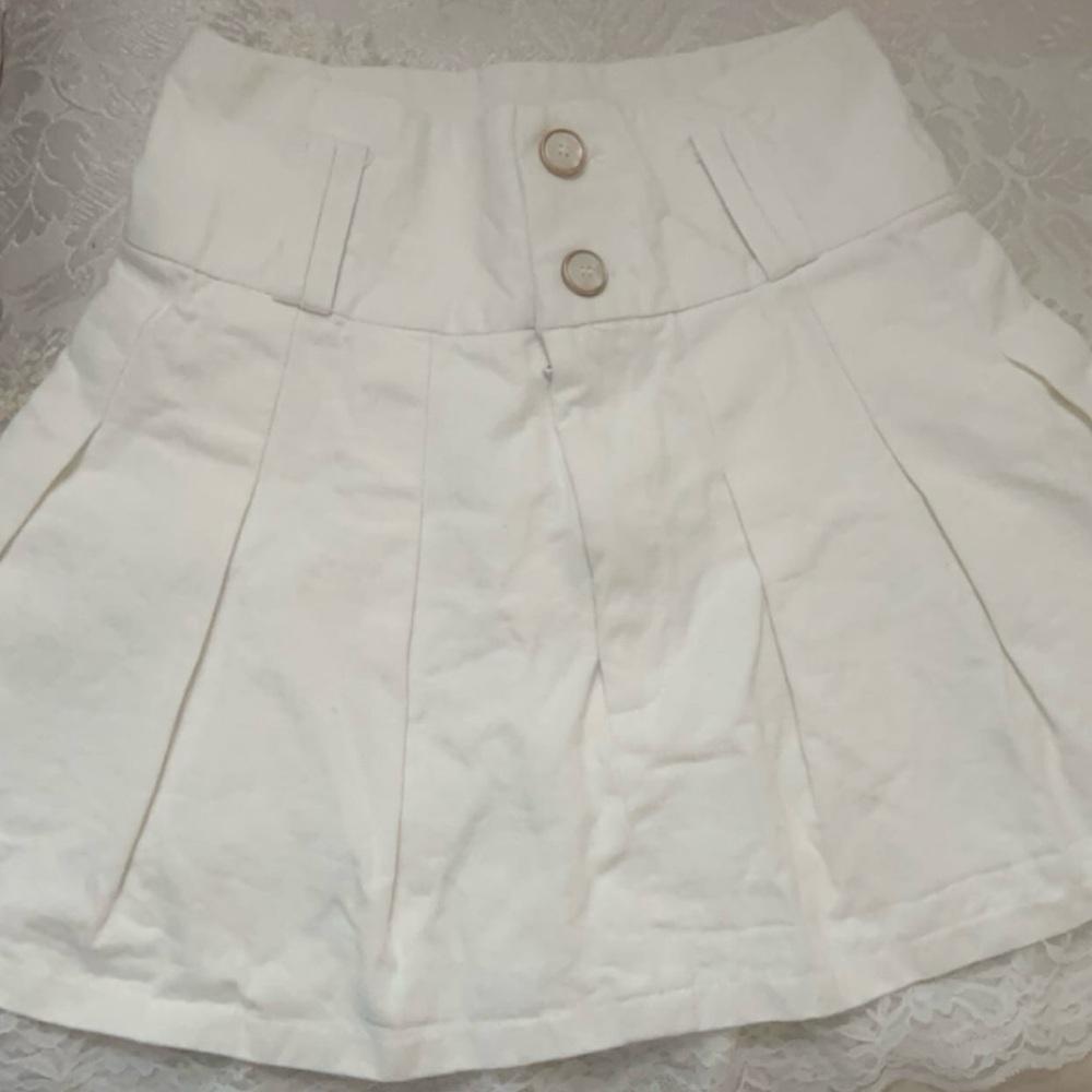 White Pleated Skirt with Button Detail